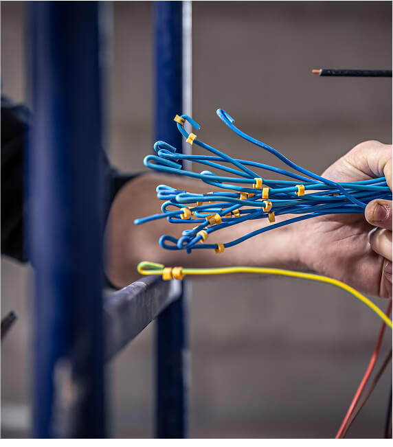 ElectroBonds electrician inspecting residential electrical equipment